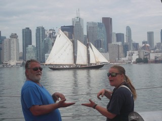 Just like the coin! Roger and Caitlin framing Bluenose II during the Toronto Parade of Sail